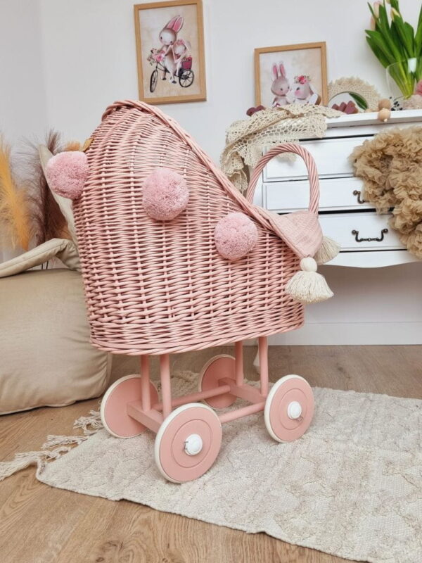Roze-poppenwagen